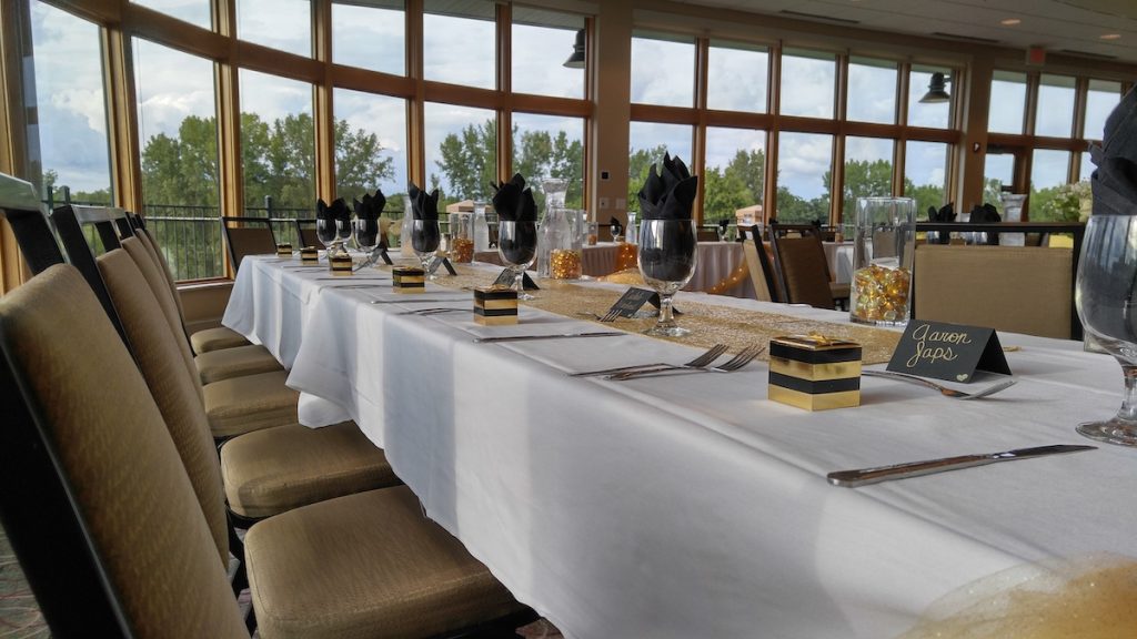 gold and black table setting